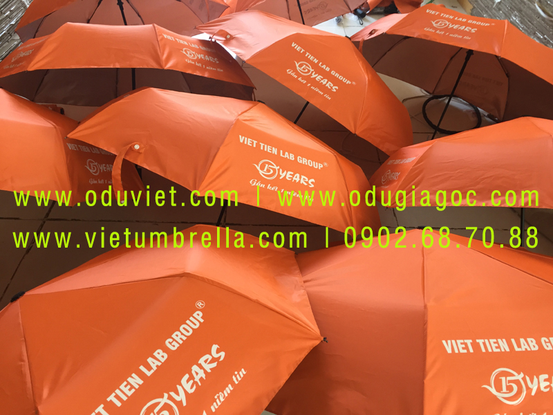 xưởng sản xuất ô dù cầm tay in logo quảng cáo